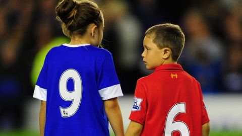LIVERPOOL, ENGLAND - SEPTEMBER 17:  Liverpool and Everton mascots pay tribute to the Hillsbrough 96 before the Premier League match between Everton and Newcastle United at Goodison Park on September 17, 2012 in Liverpool, England.  (Photo by Stu Forster/Getty Images)