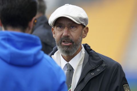Gianluca Vialli stands on the pitch before the Nations League soccer match between England and Italy at Molineux Stadium in Wolverhampton, England, Saturday, June 11, 2022. (AP Photo/Jon Super)