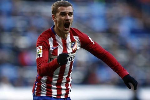 Atletico's Antoine Griezmann celebrates after scoring the opening goal during a Spanish La Liga soccer match between Real Madrid and Atletico Madrid at the Santiago Bernabeu stadium in Madrid, Spain, Saturday Feb. 27, 2016. (AP Photo/Oscar del Pozo)