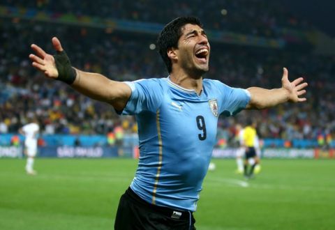 SAO PAULO, BRAZIL - JUNE 19:  Luis Suarez of Uruguay celebrates after scoring his team's second goal during the 2014 FIFA World Cup Brazil Group D match between Uruguay and England at Arena de Sao Paulo on June 19, 2014 in Sao Paulo, Brazil.  (Photo by Julian Finney/Getty Images)