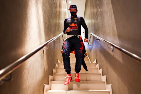 ABU DHABI, UNITED ARAB EMIRATES - DECEMBER 11: Max Verstappen of Netherlands and Red Bull Racing walks to the garage during qualifying ahead of the F1 Grand Prix of Abu Dhabi at Yas Marina Circuit on December 11, 2021 in Abu Dhabi, United Arab Emirates. (Photo by Mark Thompson/Getty Images)