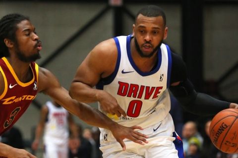 GRAND RAPIDS, MI - JANUARY 6:  Zeke Upshaw #0 of the Grand Rapids Drive brings the ball up court against the Canton Charge at The DeltaPlex Arena for the NBA G-League on JANUARY 6, 2018 in Grand Rapids, Michigan. NOTE TO USER: User expressly acknowledges and agrees that, by downloading and or using this photograph, User is consenting to the terms and conditions of the Getty Images License Agreement. Mandatory Copyright Notice: Copyright 2018 NBAE (Photo by Dennis Slagle/NBAE via Getty Images)