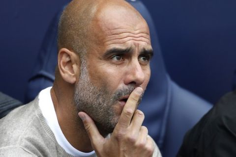 Manchester City's head coach Pep Guardiola looks on during the English Premier League soccer match between Manchester City and Brighton & Hove Albion at Etihad stadium in Manchester, England, Saturday, Aug. 31, 2019. (AP Photo/Rui Vieira)