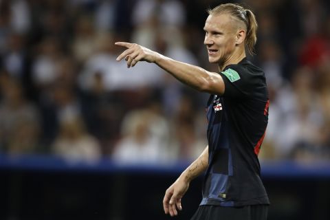 Croatia's Domagoj Vida gestures during the semifinal match between Croatia and England at the 2018 soccer World Cup in the Luzhniki Stadium in Moscow, Russia, Wednesday, July 11, 2018. (AP Photo/Francisco Seco)