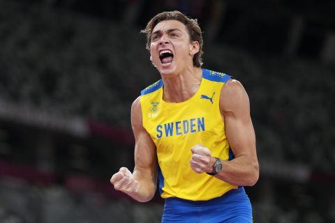 Armand Duplantis, of Sweden, reacts in the men's pole vault final at the 2020 Summer Olympics, Tuesday, Aug. 3, 2021, in Tokyo. (AP Photo/Matthias Schrader)