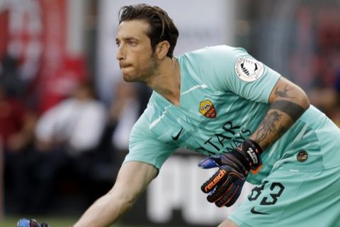 Roma's goalkeeper Antonio Mirante controls the ball during a Serie A soccer match between Inter Milan and Roma at the San Siro stadium in Milan, Italy, Sunday, June 28, 2020. (AP Photo/Luca Bruno)