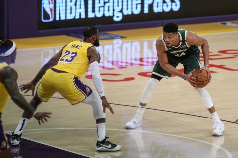  March 6, 2020, Los Angeles, CA, USA: LOS ANGELES, CA - MARCH 06: Milwaukee Bucks forward Giannis Antetokounmpo 34 being guarded by Los Angeles Lakers forward LeBron James 23 during the Milwaukee Bucks vs Los Angeles Lakers game on March 06, 2020, at Staples Center in Los Angeles, CA.  /Icon Sportswire Los Angeles USA - ZUMAi88_ 20200306_zaf_i88_133 Copyright: xJevonexMoorex
