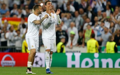Real Madrid's Cristiano Ronaldo, right, celebrates with Jese Rodriguez at the end of the Champions League semifinal second leg soccer match between Real Madrid and Manchester City at the Santiago Bernabeu stadium in Madrid, Wednesday May 4, 2016. Real Madrid won 1-0. (AP Photo/Francisco Seco)