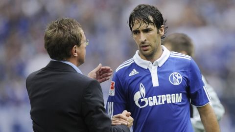 Schalke's Raul of Spain is changed out by Schalke's head coach Ralf Rangnick during the German first division Bundesliga soccer match between FC Schalke 04 and FC Cologne in Gelsenkirchen, Germany, Saturday, Aug. 13, 2011. (AP Photo/Martin Meissner)   NO MOBILE USE UNTIL 2 HOURS AFTER THE MATCH, WEBSITE USERS ARE OBLIGED TO COMPLY WITH DFL-RESTRICTIONS, SEE INSTRUCTIONS FOR DETAILS