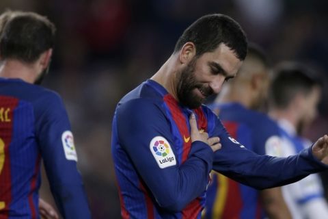 FC Barcelona's Arda Turan reacts after scoring a goal against Hercules during their Copa del Rey, Spain's King's Cup soccer match at the Camp Nou in Barcelona, Spain, Wednesday, Dec. 21, 2016. (AP Photo/Manu Fernandez)