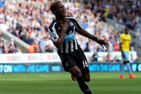 Newcastle United's Rolando Aarons celebrates his goal during their English Premier League soccer match against Crystal Palace at St James' Park, Newcastle, England, Saturday, Aug. 30, 2014. (AP Photo/Scott Heppell)
