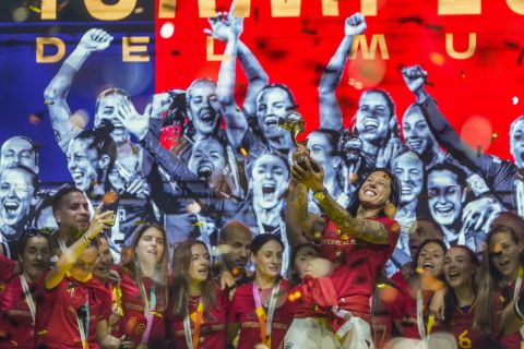 Spain's Jennifer Hermoso holds the trophy as they celebrate on stage their Women's World Cup victory in Madrid, Spain, Monday, Aug. 21, 2023. Spain beat England in Sydney on Sunday to win the Women's World Cup soccer final. (AP Photo/Manu Fernandez)