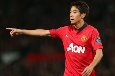 MANCHESTER, ENGLAND - SEPTEMBER 25:  Shinji Kagawa of Manchester United gestures during the Capital One Cup Third Round match betwen Manchester United and Liverpool at Old Trafford on September 25, 2013 in Manchester, England.  (Photo by Julian Finney/Getty Images)
