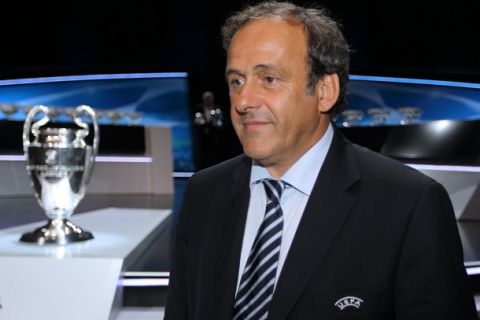 Head of The Union of European Football Associations (UEFA) Michel Platini arrives for the draw ceremony for the UEFA 2010/2011 Champions League on August 26, 2010 in Monaco.  AFP PHOTO VALERY HACHE (Photo credit should read VALERY HACHE/AFP/Getty Images)