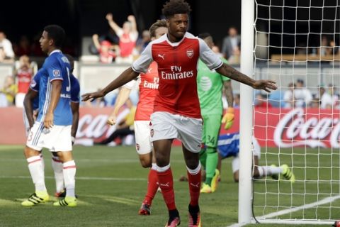 Arsenal forward Chuba Akpom, center, celebrates after scoring against the MLS All-Stars during the second half of the MLS All-Star soccer game Thursday, July 28, 2016, in San Jose, Calif. Arsenal won 2-1. (AP Photo/Marcio Jose Sanchez)