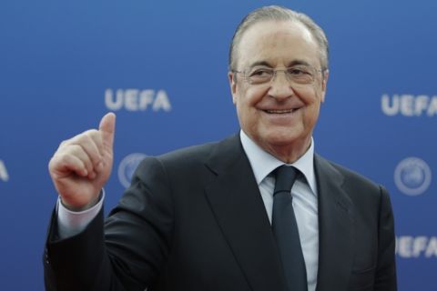 Real Madrid President Florentino Perez gives a thumps up as he arrives for the UEFA Champions League draw at the Grimaldi Forum, in Monaco, Thursday, Aug. 30, 2018. (AP Photo/Claude Paris)