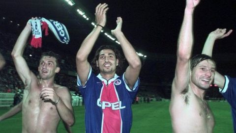 Paris St Germain's players (left to right) Franck Gava, Eric Rabesandratana and Leonardo Nascimento, of Brazil waves to the crowd after their team defeated  Steaua Bucharest during their second-leg second-round Champion Cup qualifier match, at the Parc des Princes stadium in Paris, Wednesday August 27, 1997.  Paris St Germain won 5-0 and is qualified for the Champions League.(AP  Photo/Laurent Rebours)