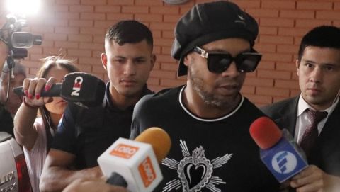 Former Brazilian soccer star Ronaldinho, or Ronaldo de Assis Moreira, enters Paraguay's attorney offices in Asuncion, Paraguay, Thursday, March 5, 2020. According to local news, Ronaldinho is accused of arriving in the country with a fake Paraguay passport. (AP Photo/Jorge Saenz)