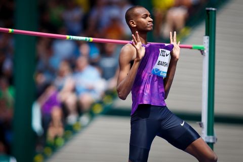 Mutual Essa Barshim shows off his name tag after winning the men's high jump competition after only one attempt from the entire day. The 41st annual Prefontaine Classic welcomes world-class athletes to compete at Hayward Field in Eugene, Ore., on May 29  30 2015. (Ryan Kang/Emerald)
