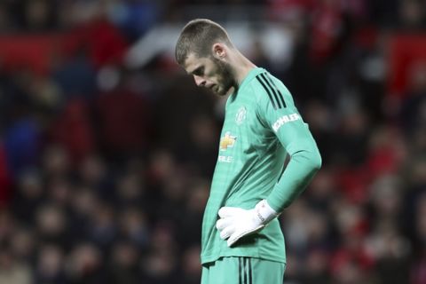 Manchester United goalkeeper David de Gea reacts during the English Premier League soccer match between Manchester United and Manchester City at Old Trafford Stadium in Manchester, England, Wednesday April 24, 2019. (AP Photo/Jon Super)