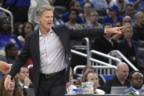 Golden State Warriors head coach Steve Kerr shouts instructions during the first half of an NBA basketball game against the Orlando Magic, Friday, Dec. 1, 2017, in Orlando, Fla. (AP Photo/Phelan M. Ebenhack)