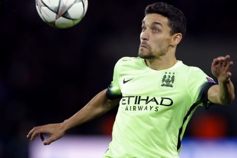 Manchester City's Jesus Navas eyes the ball during the Champions League quarterfinal first leg soccer match between Paris St Germain and Manchester City at the Parc des Princes stadium in Paris, Wednesday, April 6, 2016. (AP Photo/Christophe Ena)
