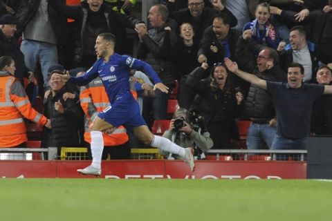 Chelsea's Eden Hazard celebrates after scoring his side's second goal during the English League Cup soccer match between Liverpool and Chelsea at Anfield stadium in Liverpool, England, Wednesday, Sept. 26, 2018. (AP Photo/Rui Vieira)