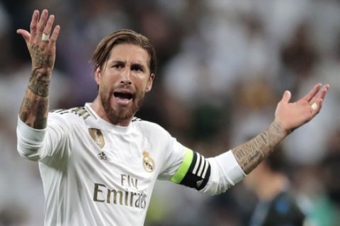 Real Madrid's Sergio Ramos reacts during the Champions League group A soccer match between Real Madrid and Club Brugge, at the Santiago Bernabeu stadium in Madrid, Tuesday, Oct. 1, 2019. (AP Photo/Bernat Armangue)