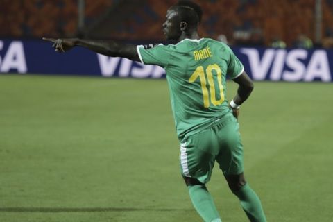 Senegal's Sadio Mane celebrates after a goal during the African Cup of Nations round of 16 soccer match between Uganda and Senegal in Cairo International stadium in Cairo, Egypt, Friday, July 5, 2019. (AP Photo/Hassan Ammar)