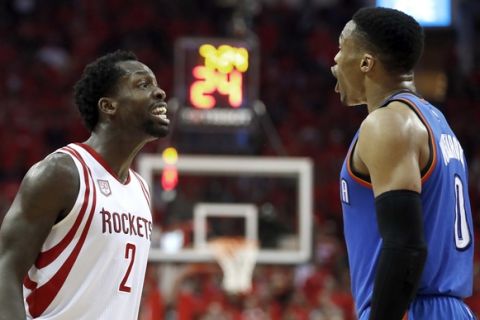 Houston Rockets' Patrick Beverley (2) and Oklahoma City Thunder's Russell Westbrook (0) yell at each other during the second half of Game 5 in an NBA basketball first-round playoff series, Tuesday, April 25, 2017, in Houston. Both players were given a technical foul. The Rockets won 105-99, taking the series. (AP Photo/David J. Phillip)