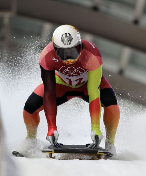 Alexander Gassner of Germany brakes in the finish area after his second run during the men's skeleton competition at the 2018 Winter Olympics in Pyeongchang, South Korea, Thursday, Feb. 15, 2018. (AP Photo/Wong Maye-E)