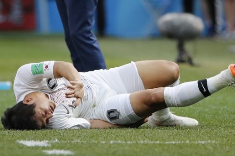 South Korea's Park Joo-ho reacts after getting injured during the group F match between Sweden and South Korea at the 2018 soccer World Cup in the Nizhny Novgorod stadium in Nizhny Novgorod, Russia, Monday, June 18, 2018. (AP Photo/Pavel Golovkin)