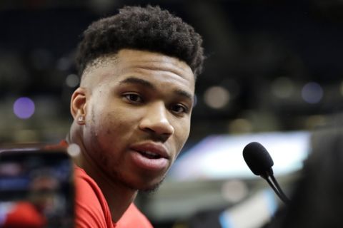 Giannis Antetokounmpo, of the Milwaukee Bucks, speaks at the NBA All-Star basketball game media day, Saturday, Feb. 15, 2020, in Chicago.  (AP Photo/Nam Y. Huh)
