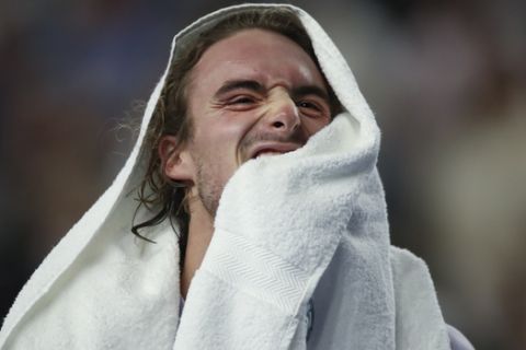 Stefanos Tsitsipas of Greece celebrates winning the men's singles final of the Open 13 Provence tennis tournament against Felix Auger-Aliassime of Canada in two sets, 6-3, 6-4, in Marseille, southern France, Sunday, Feb. 23, 2020. (AP Photo/Daniel Cole)