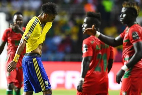 Gabon's forward Pierre-Emerick Aubameyang reacts as he walks off the pitch during the 2017 Africa Cup of Nations group A football match between Gabon and Guinea-Bissau at the Stade de l'Amitie Sino-Gabonaise in Libreville on January 14, 2017. / AFP PHOTO / GABRIEL BOUYS