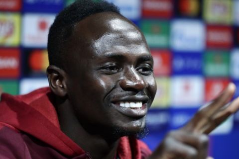 Liverpool's Sadio Mane gestures during a press conference at the Camp Nou stadium in Barcelona, Spain, Tuesday, April 30, 2019. FC Barcelona will play against Liverpool in a first leg semifinal Champions League soccer match on Wednesday, May 1. (AP Photo/Manu Fernandez)