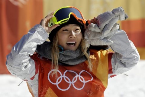 Chloe Kim, of the United States, smiles during the women's halfpipe finals at Phoenix Snow Park at the 2018 Winter Olympics in Pyeongchang, South Korea, Tuesday, Feb. 13, 2018. (AP Photo/Lee Jin-man)