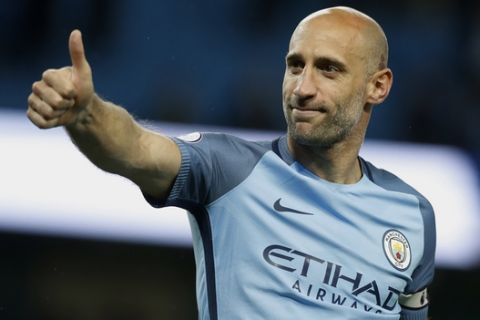 Manchester City's Pablo Zabaleta gestures after the final whistle during the English Premier League soccer match against West Bromwich Albion at the Etihad Stadium, Manchester, England, Tuesday, May 16, 2017. (Martin Rickett/PA via AP)