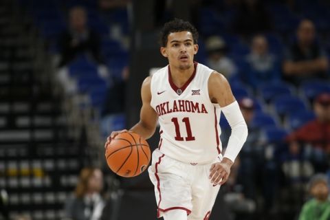 Oklahoma's Trae Young (5) during an NCAA college basketball game during the Phil Knight Invitational tournament in Portland, Ore., Friday, Nov. 24, 2017. (AP Photo/Timothy J. Gonzalez)
