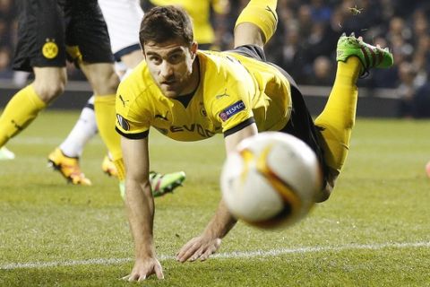 Dortmund's Sokratis during the Europa League round of 16 second leg soccer match between Tottenham Hotspur and Borussia Dortmund at the White Hart Lane stadium in London, England, Friday, March 18, 2016 . (AP Photo/Frank Augstein)