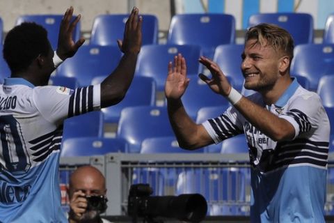 Lazio's Ciro Immobile, right, celebrates his side' second goal with Felipe Caicedo during a Serie A soccer match between Lazio and Genoa at Rome's Olympic stadium, Sunday, Sept. 23, 2018. (AP Photo/Alessandra Tarantino)