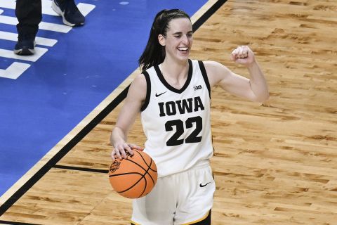 Iowa guard Caitlin Clark (22) reacts as time winds off the clock against LSU in an Elite Eight round college basketball game during the NCAA Tournament, Monday, April 1, 2024, in Albany, N.Y. (AP Photo/Hans Pennink)