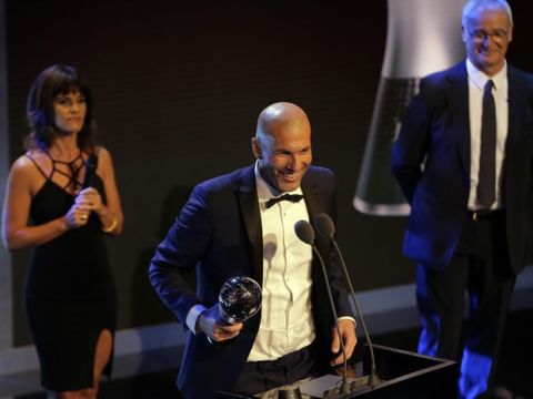 Soccer coach Zinedine Zidane receives The Best FIFA Men's Coach award during the The Best FIFA 2017 Awards at the Palladium Theatre in London, Monday, Oct. 23, 2017. (AP Photo/Alastair Grant)