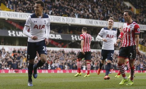 Tottenham Hotspur's Dele Alli, left, celebrates after scoring during the English Premier League soccer match between Tottenham Hotspur and Southampton at White Hart Lane stadium in London, Sunday, March 19, 2017.(AP Photo/Frank Augstein)