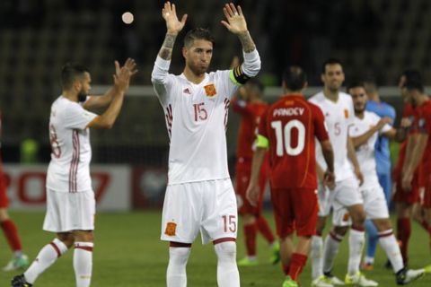 Spain's Sergio Ramos celebrates his team's 1-2 victory against Macedonia in a World Cup Group G qualifying soccer match at the Philip II National Stadium in Skopje, Macedonia, on Sunday, June 11, 2017. (AP Photo/Boris Grdanoski)