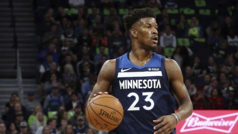 Minnesota Timberwolves' Jimmy Butler plays against the Houston Rockets during the first half of Game 4 in an NBA basketball first-round playoff series Monday, April 23, 2018, in Minneapolis. (AP Photo/Jim Mone)