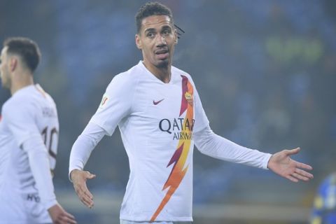 Roma's Chris Smalling in action during an Italian Cup soccer match between Parma and Roma at the Tardini Stadium, in Parma, Italy, Thursday, Jan. 16, 2020. (Fabio Rossi/Lapresse via AP)