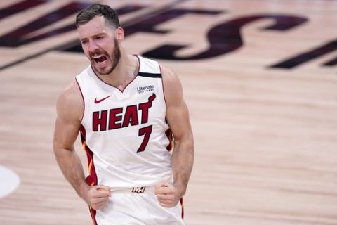 Miami Heat guard Goran Dragic (7) celebrates after sinking a basket against the Boston Celtics during the second half of an NBA conference final playoff basketball game, Thursday, Sept. 17, 2020, in Lake Buena Vista, Fla. (AP Photo/Mark J. Terrill)