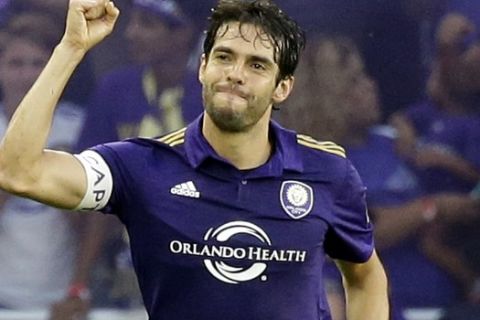 Orlando City's Kaka, left, celebrates his goal against Sporting Kansas City during the first half of an MLS soccer game, Saturday, May 13, 2017, in Orlando, Fla. (AP Photo/John Raoux)