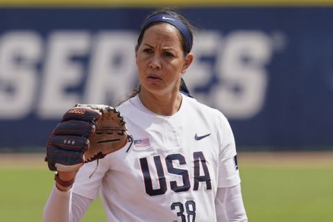 FILE - USA Softball pitcher Cat Osterman pitches in an exhibition softball game against USSSA Pride in Oklahoma City, Okla., in this Friday, June 4, 2021, file photo. U.S. coach Ken Eriksen predicts tight competition in softball as the sport returns to the Olympics for the first time since 2008. The 15-woman U.S. roster includes 38-year-old left-hander Cat Osterman, the last holdover from the 2004 gold medal-winning team, and 35-year-old left-hander Monica Abbott, who joined Osterman on the 2008 team. (AP Photo/Sue Ogrocki, File)